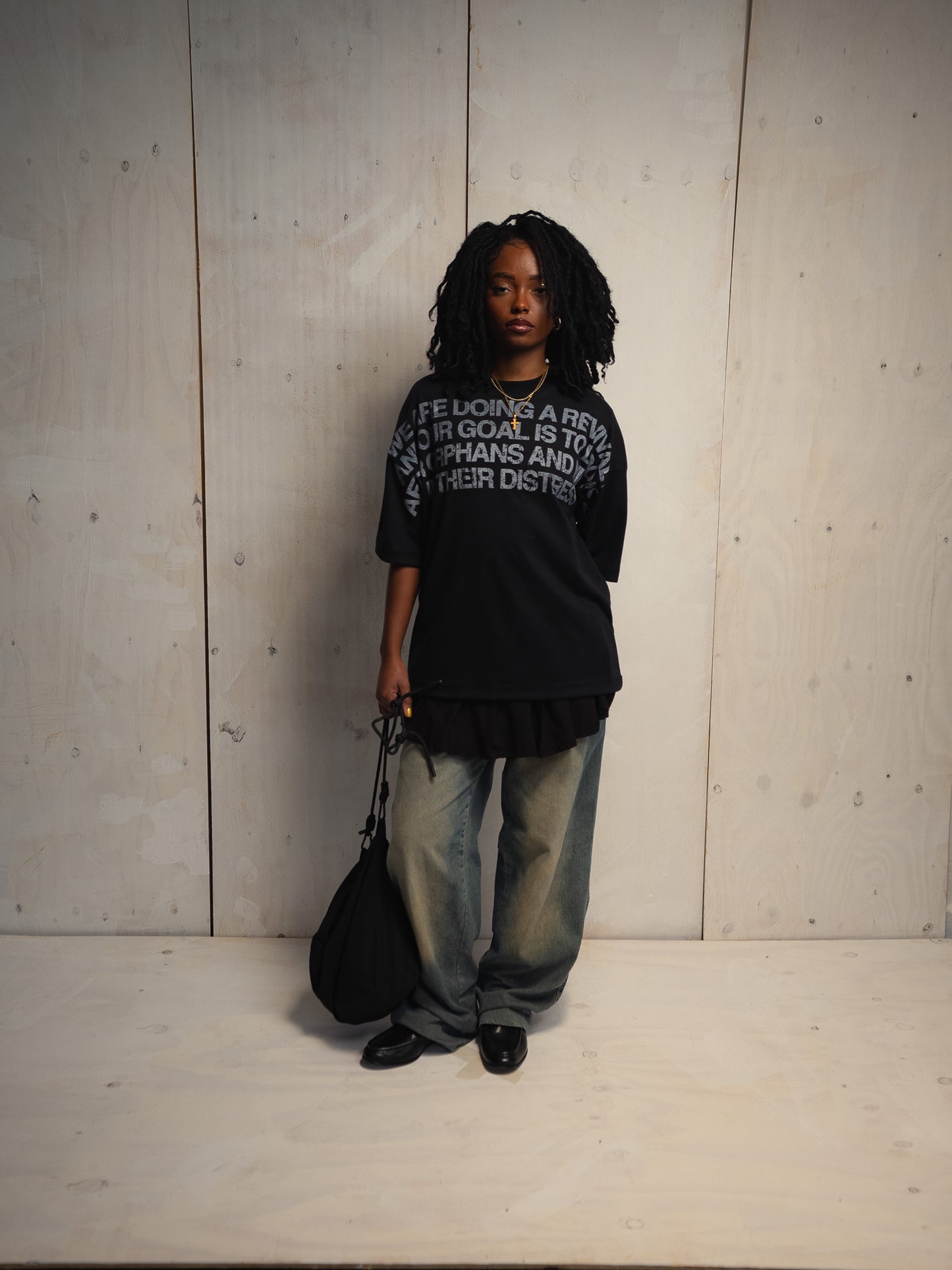 GOD IS NOT A RELIGION BLACK T-SHIRT
