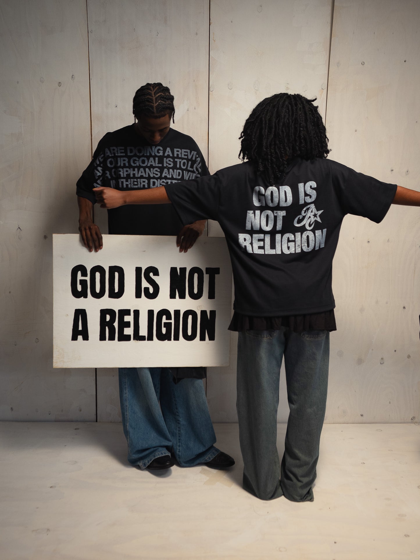 GOD IS NOT A RELIGION BLACK T-SHIRT